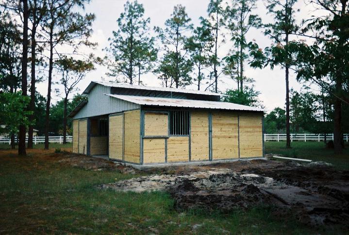 TONGUE AND GROOVE RCA BARN WITH GRILLED WINDOWS AND SHUTTERS